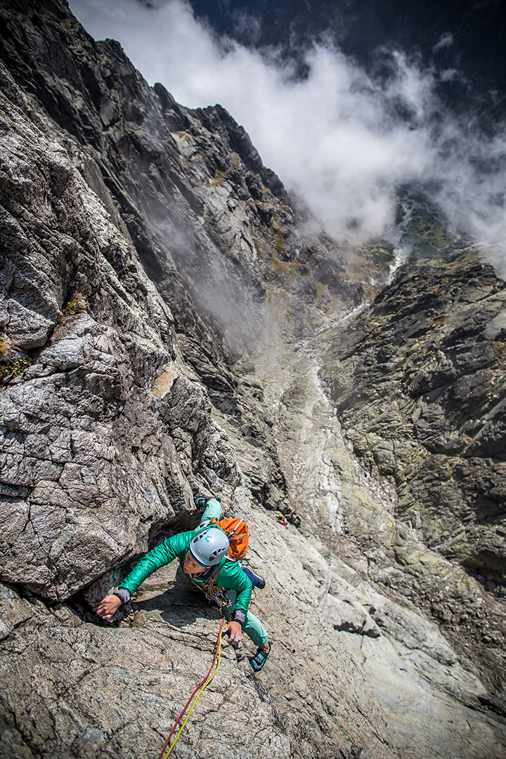 Another hard place is the overhanging dihedral. Easier if you're tall enough to grab the jugs from good foot holds.