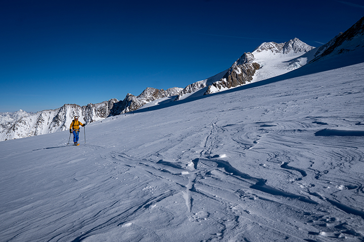 Skituring with Wildspitze in the background.